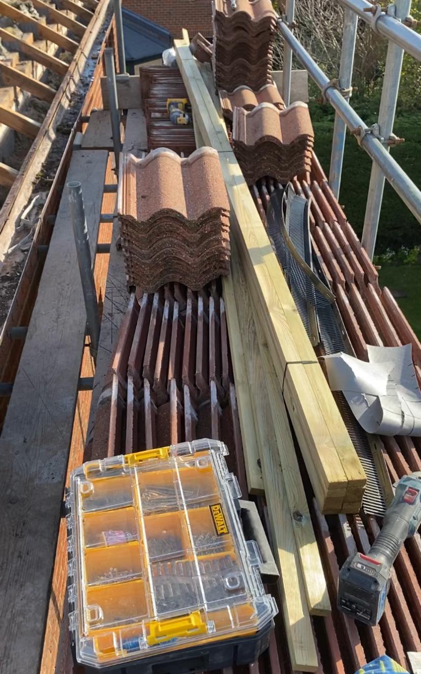 Quality Materials & Scaffolding - Yorkshire - Professional tile stacks and materials ready for re-roofing project.